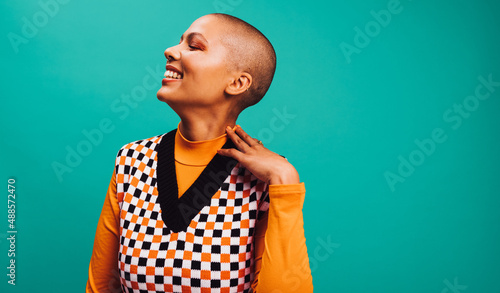 Canvas-taulu Confident short-haired woman smiling in a studio