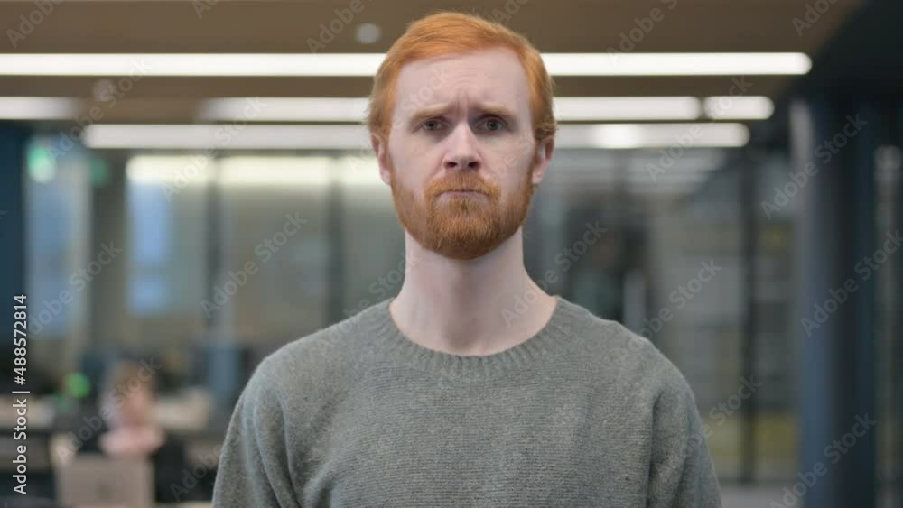 Portrait of Young Man Showing No Sign by Shaking Head, Denial Portrait of Young Man Showing No Sign by Shaking Head, Denial