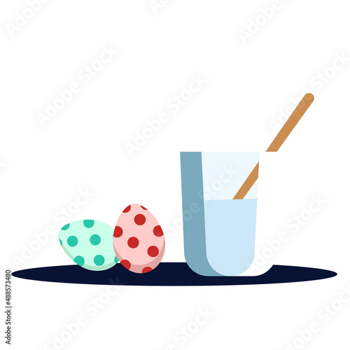 water and a brush for decorating Easter eggs