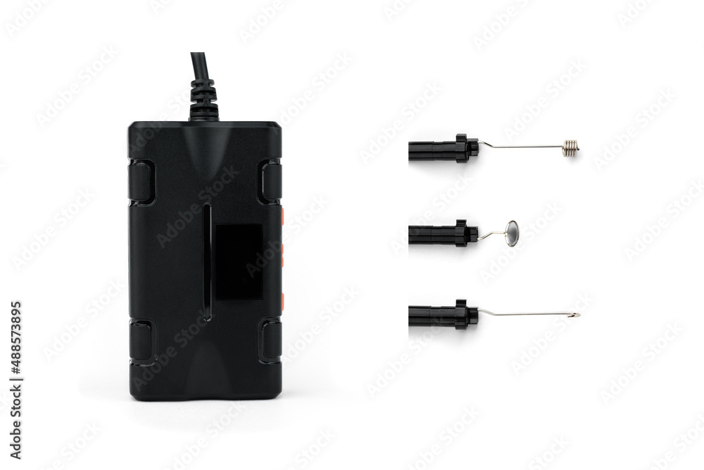 Video endoscope isolated on white background. Attachments for video endoscope: mirror, magnet and hook. Video endoscope isolated on white background. Attachments for video endoscope: mirror, magnet and hook.