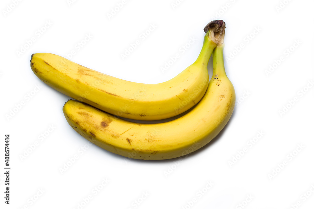 Two bananas lie on a white background.