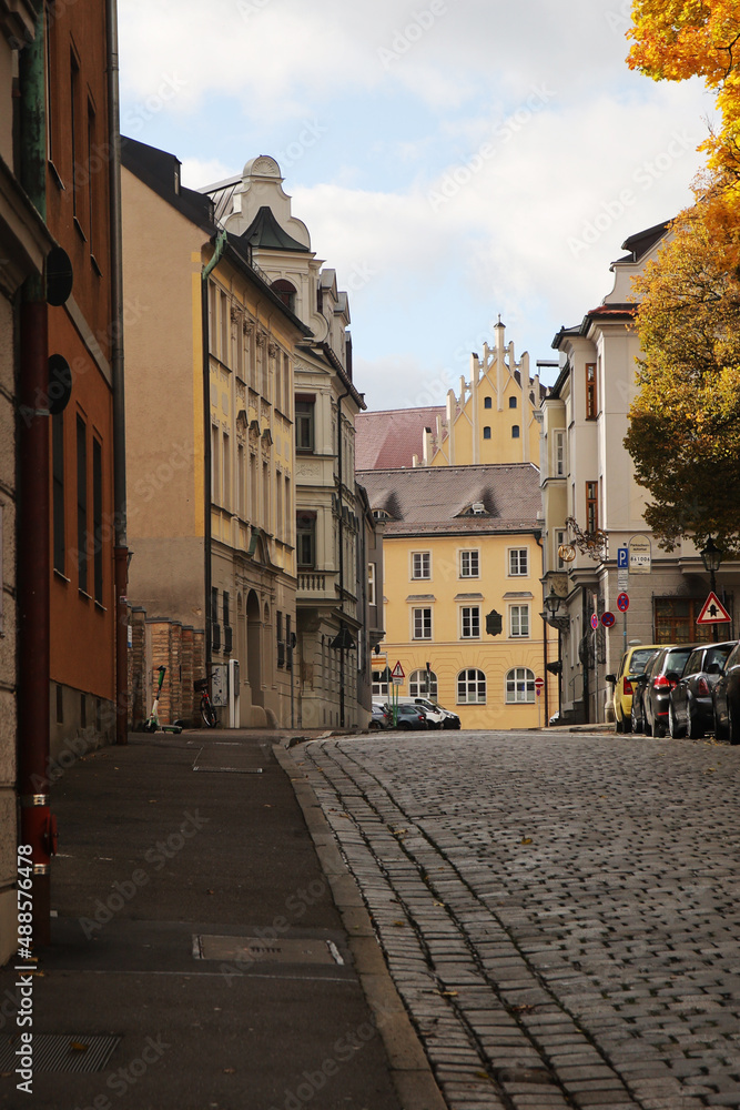 Fototapeta premium Old paved street in the center of Augsburg, Germany
