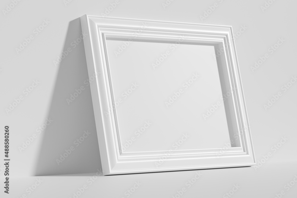 Horizontal rectangular photo frame on floor leaning at wall diagonal view