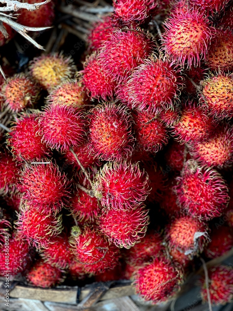 rambutan on a market stall rambutan on a market stall