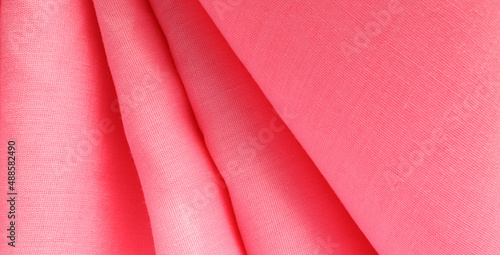 Elegant pink silk or satin. Luxurious background design.