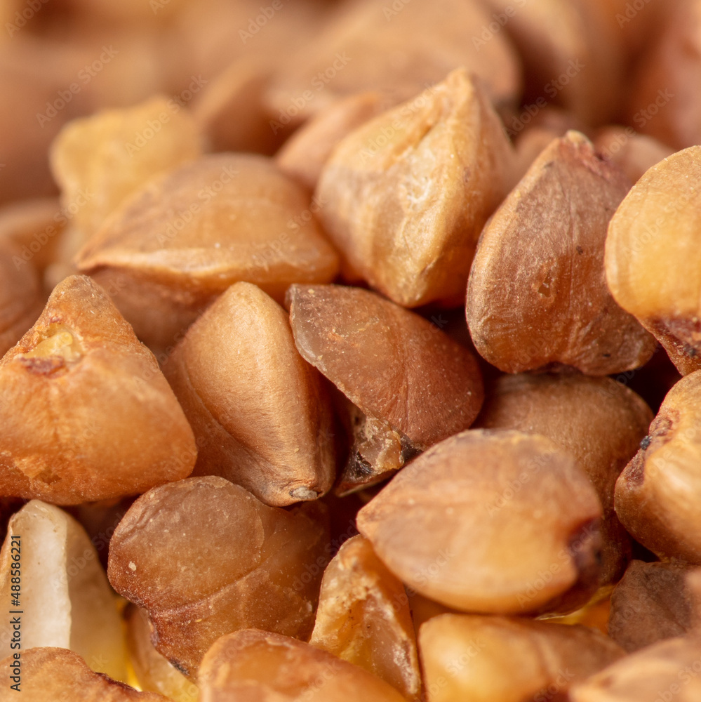 Close-up of buckwheat groats as background. Close-up of buckwheat groats as background.