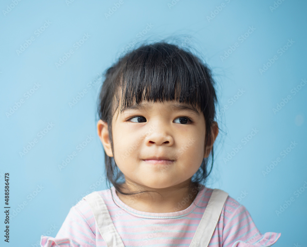 A headshot portrait of a cheerful baby Asian woman, a cute toddler little girl with adorable bangs hair, a child wearing a purple sweater smiling and don't looking to the camera. A headshot portrait of a cheerful baby Asian woman, a cute toddler little girl with adorable bangs hair, a child wearing a purple sweater smiling and don't looking to the camera.