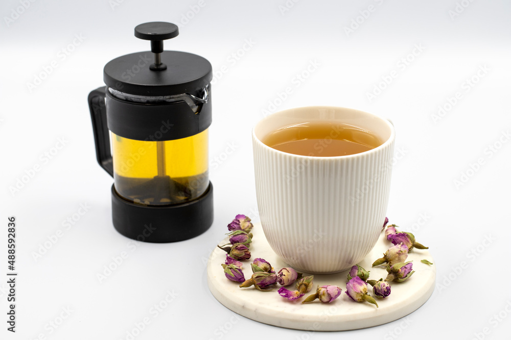 Bud Rose Tea on a white background. Medicinal herbal tea. Bud Rose Tea on a white background. Medicinal herbal tea.