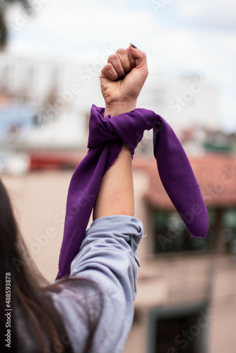 Konstfotografi WOMAN'S FIST WITH FEMINIST SCARF