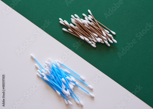 A comparison of eco-friendly and plastic cotton buds flat lay photo