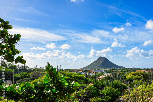 A panoramic view of the Caribbean island of Aruba from the Casibari Rock Formations under blue skies photo