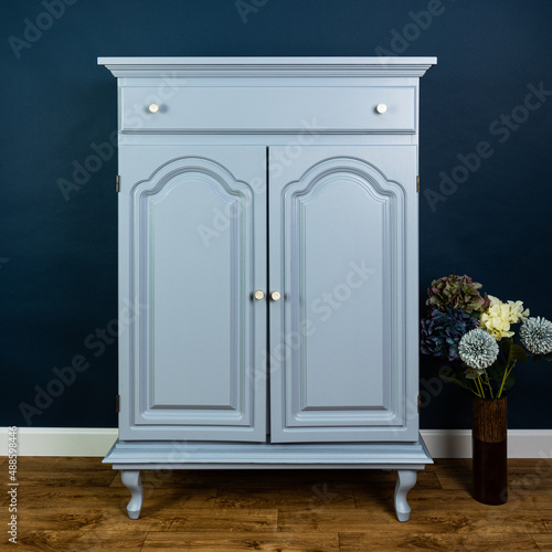 Blue painted furniture after renovation has second life photo