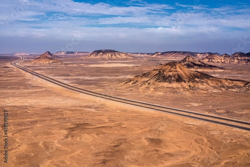 Black desert with mounds in Egypt photo