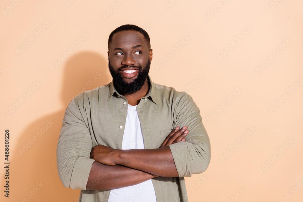 Photo of funny millennial beard hr guy crossed palms look promo wear grey outfit isolated on beige background Photo of funny millennial beard hr guy crossed palms look promo wear grey outfit isolated on beige background