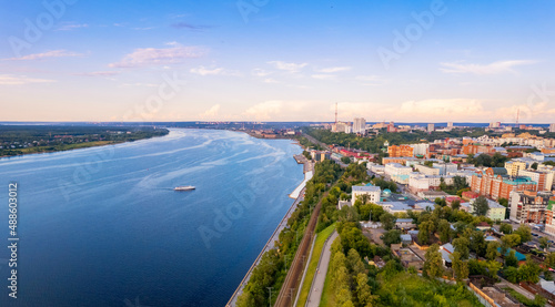 Aerial top view panorama city Perm and central embankment of Kama river Russia, sunset drone photo photo