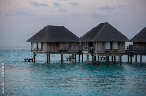 Fototapeta Naklejka Na Ścianę i Meble -  Water Bungalows in Turquoise Sea at Maldives