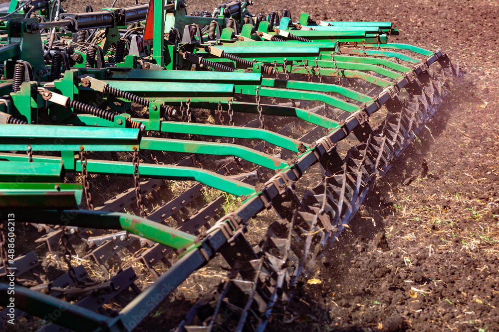 Versatile cultivator with disk, cultivate, harrow tools for secondary tillage - agricultural preparation of soil by mechanical agitation of various types, such as digging, stirring, and overturning.