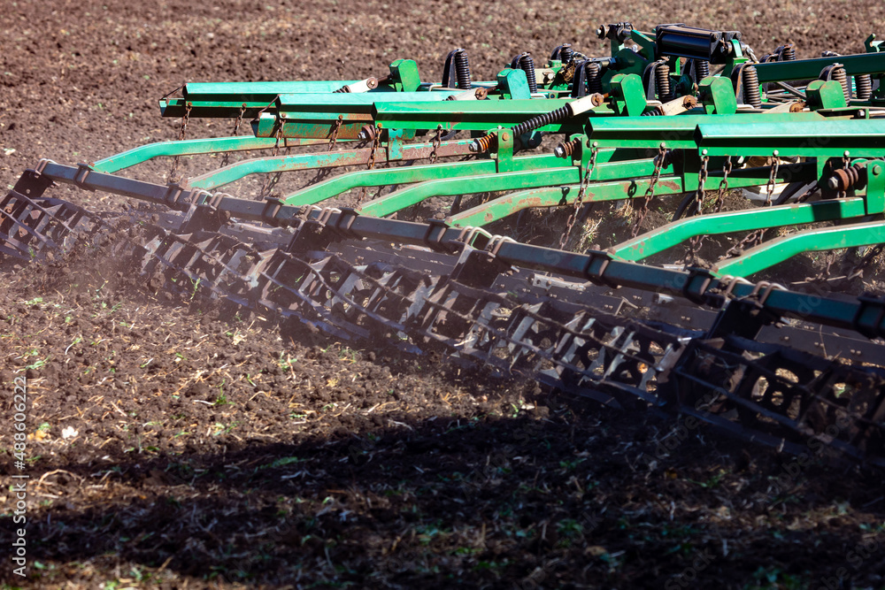 Versatile cultivator with disk, cultivate, harrow tools for secondary tillage - agricultural preparation of soil by mechanical agitation of various types, such as digging, stirring, and overturning.