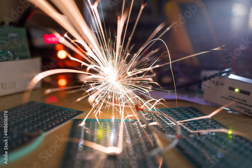 Microcircuit for TFT with wires sparkles with electric sparks photo