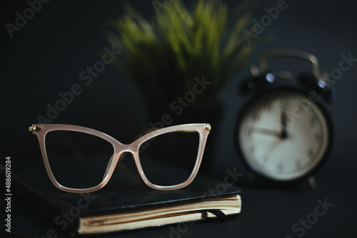glasses and book