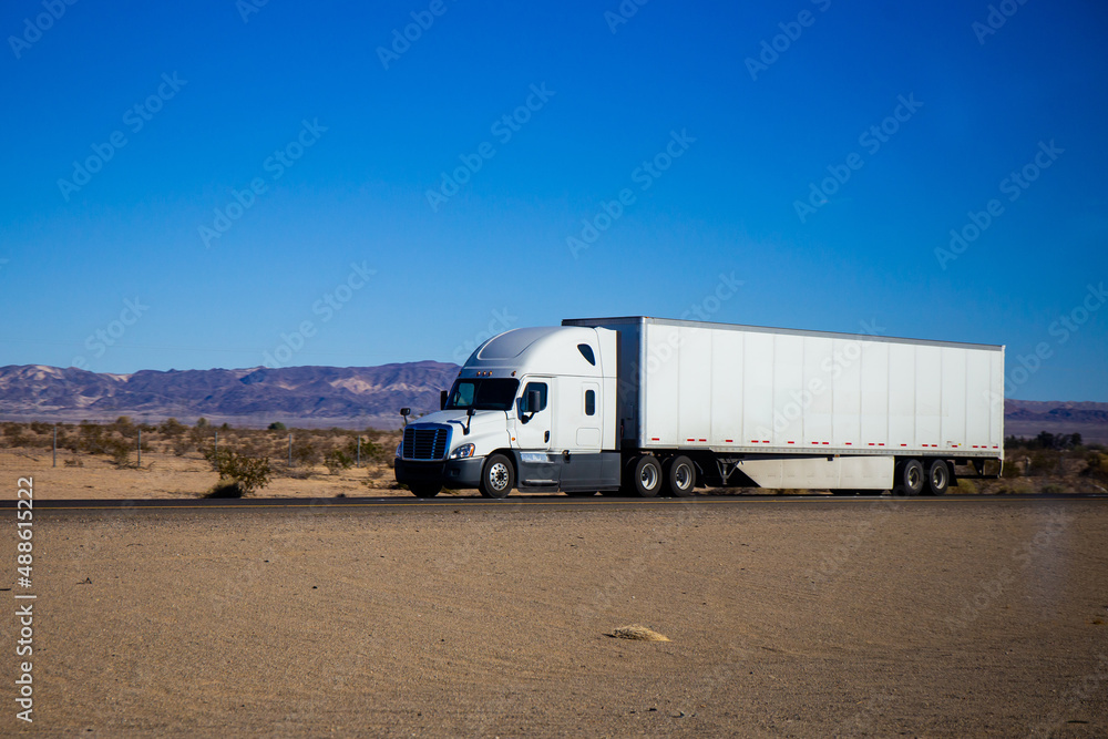Semi Trucks on the Nevada Highway, USA. Trucking in Nevada , USA Semi Trucks on the Nevada Highway, USA. Trucking in Nevada , USA