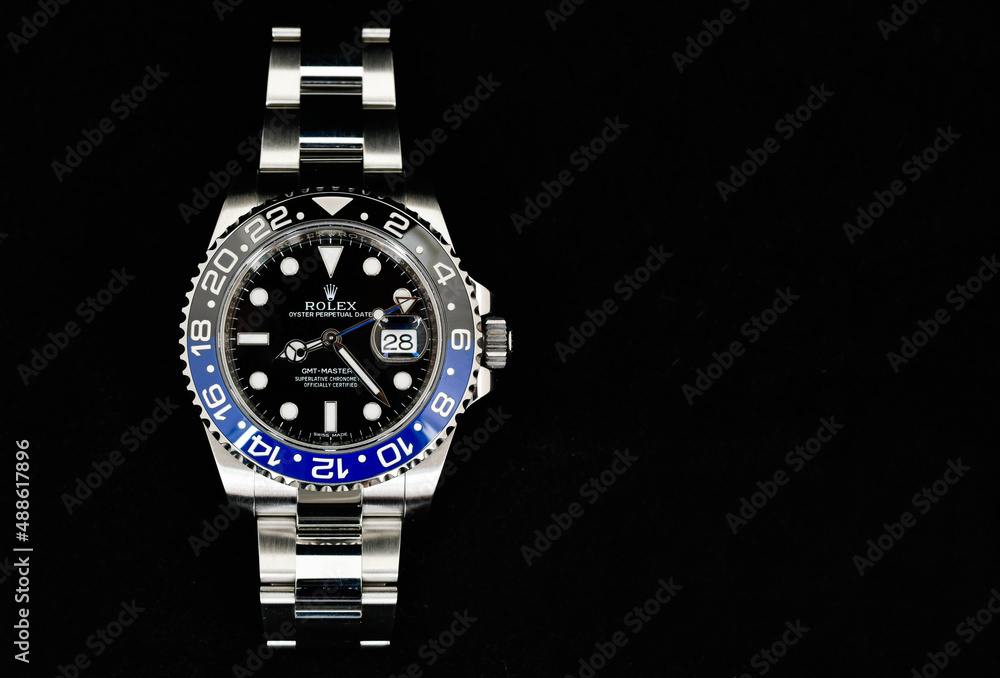 Bangkok Thailand- Feb 20,2022 :Close up Rolex GMT-Master II "Batman"40mm  with blue-black bezel Steel Ceramic Men's Wrist watch on black background  Stock 写真 | Adobe Stock
