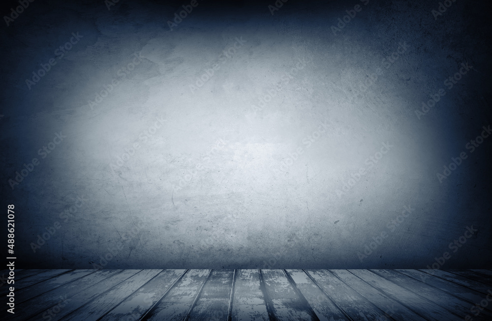 Empty wooden floor and blank blue concrete wall interior garage studio room. Copy space or product display. Empty wooden floor and blank blue concrete wall interior garage studio room. Copy space or product display.