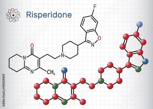 Risperidon molecule. It is antipsychotic medication, used to treat of schizophrenia, bipolar mania, psychosis, depression. Structural chemical formula, molecule model. Sheet of paper in a cage