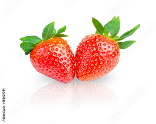 two isolated strawberries on a white background