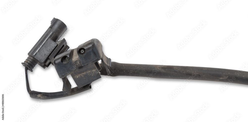 Black plastic car windshield washer nozzles close-up on an isolated white background. Established jets spare parts for auto-analysis. Black plastic car windshield washer nozzles close-up on an isolated white background. Established jets spare parts for auto-analysis.