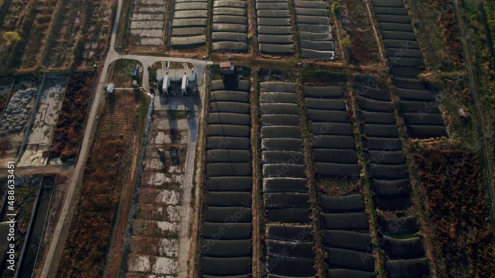 Aerial panoramic view of Water treatment facilities. Sewage treatment plant. Round sedimentation tanks. Radial primary sump. Sedimentation tanks of treatment facilities Aerial panoramic view of Water treatment facilities. Sewage treatment plant. Round sedimentation tanks. Radial primary sump. Sedimentation tanks of treatment facilities