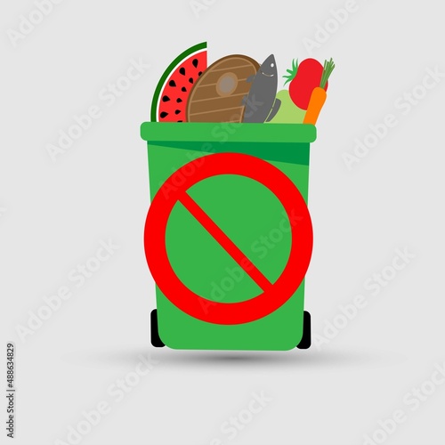 Foodstuff in a garbage bin with the stop sign on it. Reduce food waste concept