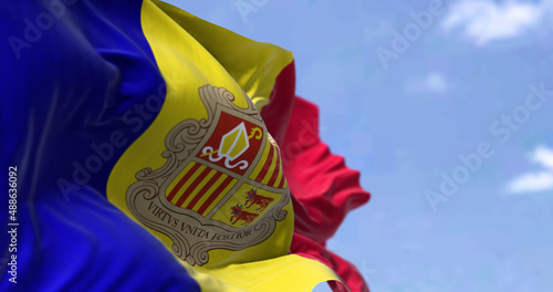 Detail of the national flag of Andorra waving in the wind on a clear da