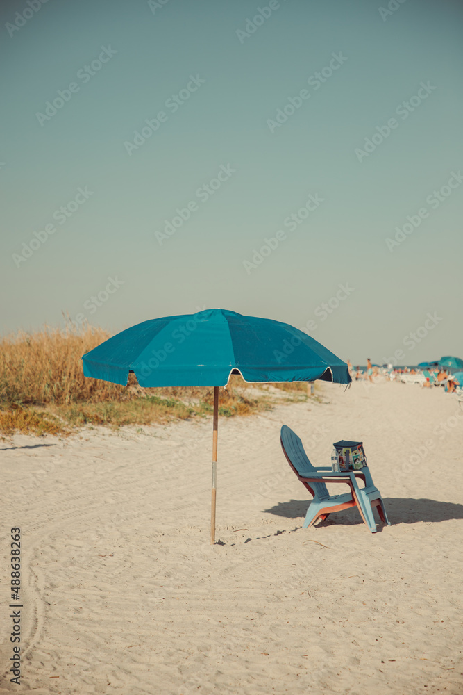 Beach chairs and umbrella