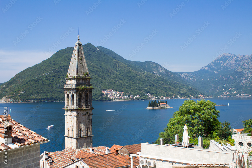 Panoramic view of the city, islands and bay on the sunny day. Perast. Montenegro.