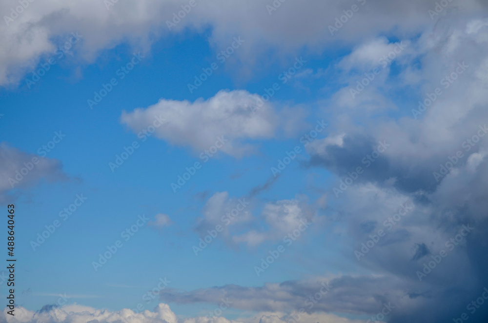 Blue beautiful sky with white clouds in sunny day