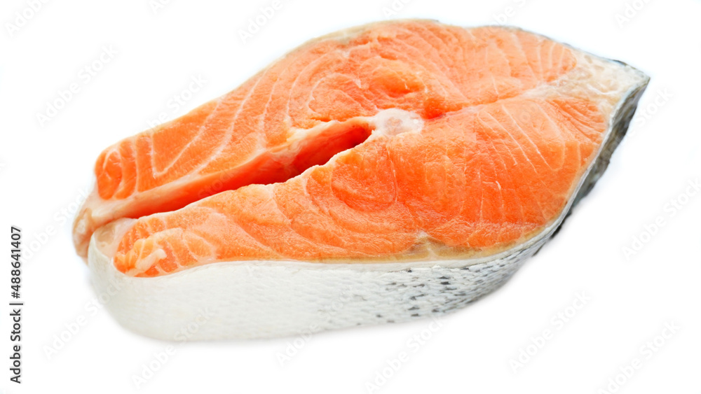Raw filet of salmon fish steak isolated on a white background.