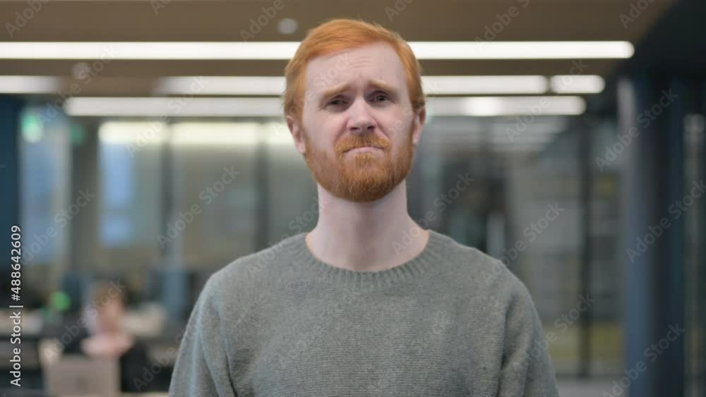 Portrait of Disappointed Young Man Reacting to Loss Portrait of Disappointed Young Man Reacting to Loss