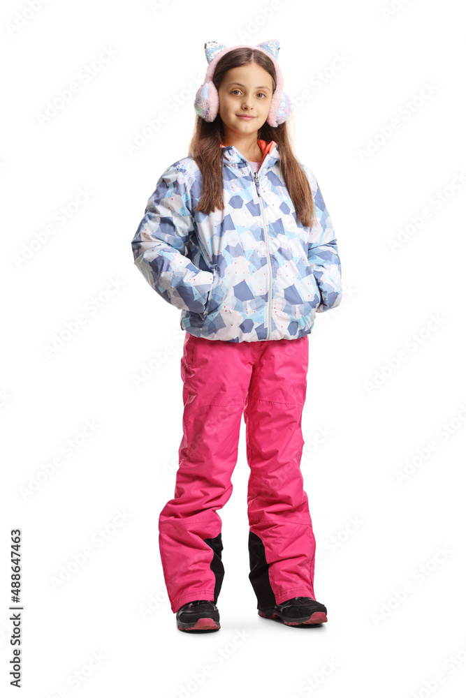 Full length portrait of a girl wearing winter jacket and ear warmers Full length portrait of a girl wearing winter jacket and ear warmers