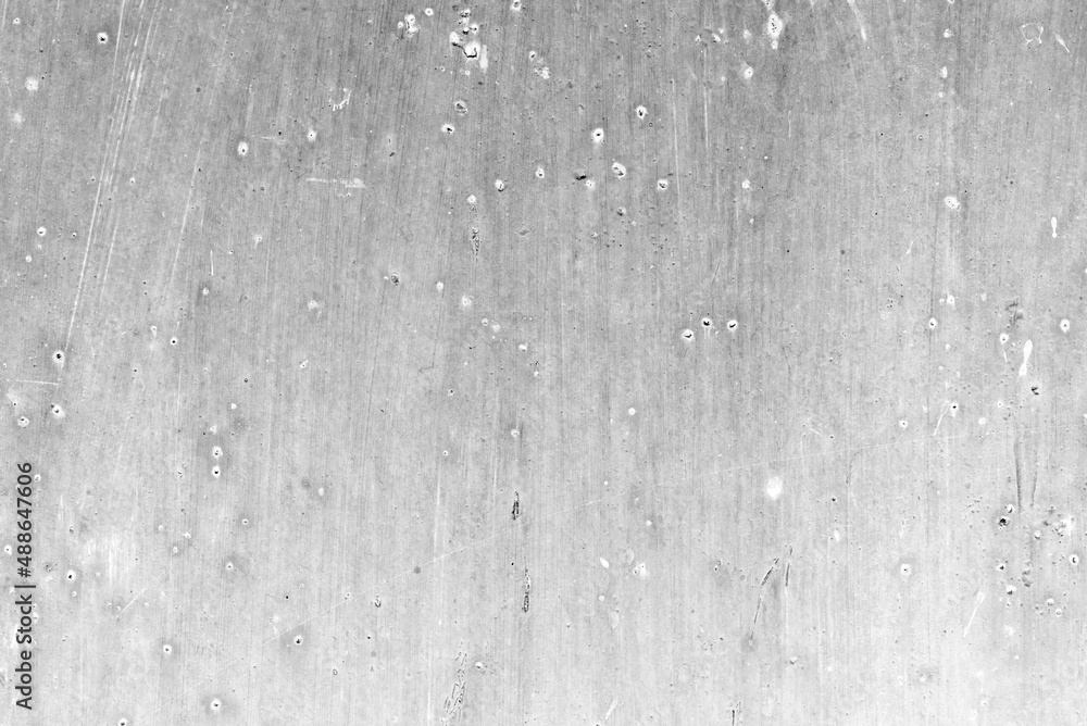 Metal texture with scratches and cracks which can be used as a background Metal texture with scratches and cracks which can be used as a background