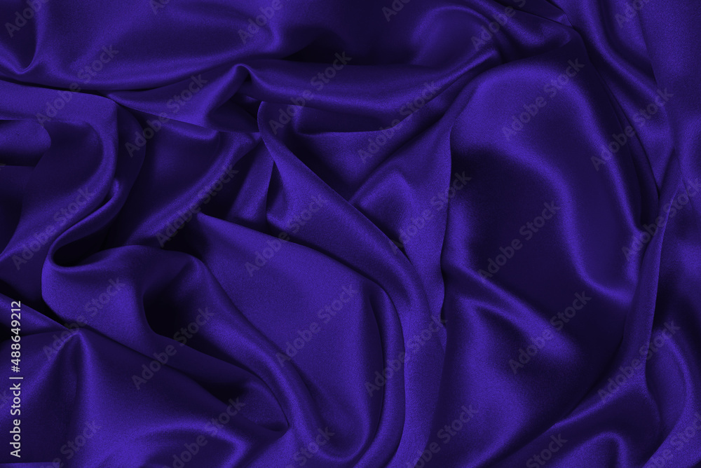 Purple silk or satin luxury fabric texture can use as abstract background. Purple silk or satin luxury fabric texture can use as abstract background.