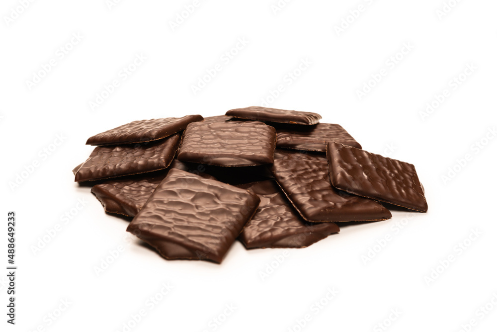 Dark chocolate candies isolated on white background. Dark chocolate candies isolated on white background.