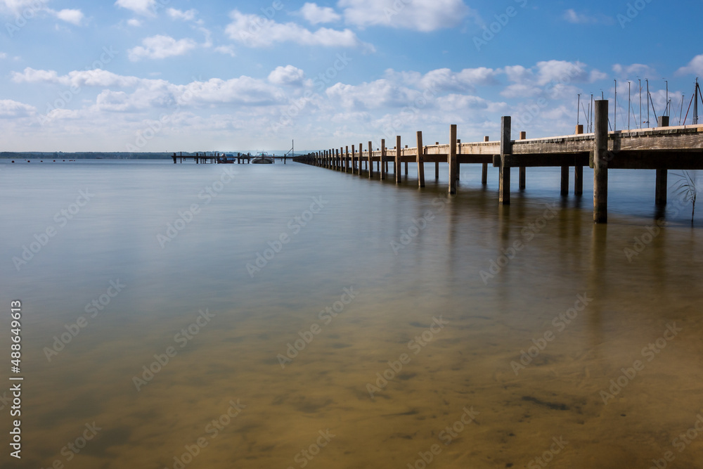 Jetty as the leading line to the horizon. Steinhuder Meer near Wunsdorf in Lower Saxony.