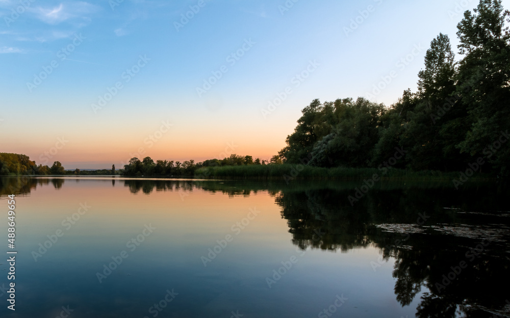 Sunset at the lake. reflections in the water. Giftener See in Sarstedt near Hildesheim