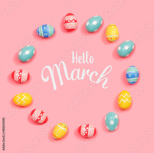Fototapeta Naklejka Na Ścianę i Meble -  Hello March message with round frame of Easter eggs