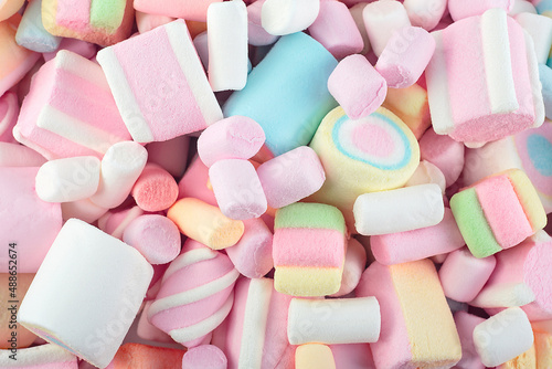 Texture of multi-colored sweet marshmallows. Marshmallows candy for background. photo