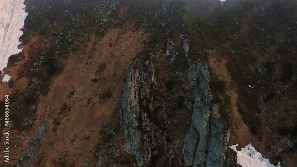 In the tract Gajina, fantastic rock outcrops stick out like bones and members of the body Chornogorа Carpathians. Spring height comes late wild dangerous places legendary places. Drone flying video In the tract Gajina, fantastic rock outcrops stick out like bones and members of the body Chornogorа Carpathians. Spring height comes late wild dangerous places legendary places. Drone flying video