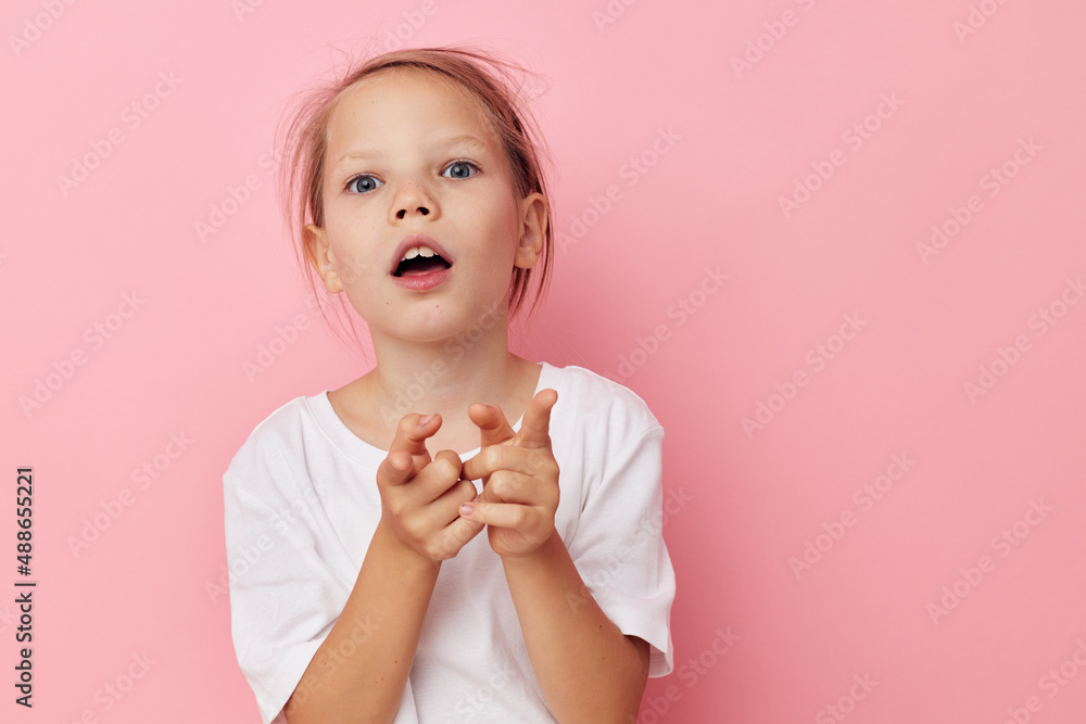 Portrait of happy smiling child girl grimace posing fun Lifestyle unaltered Portrait of happy smiling child girl grimace posing fun Lifestyle unaltered