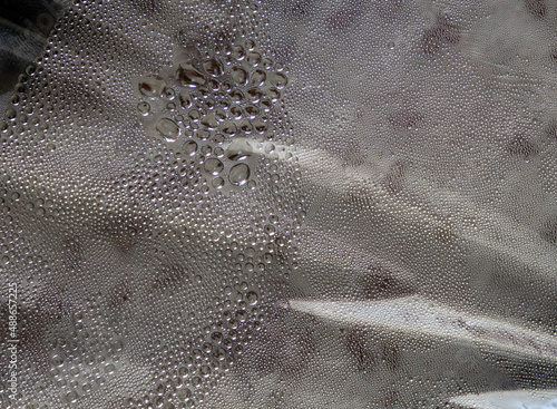 Droplets of steam on a transparent film