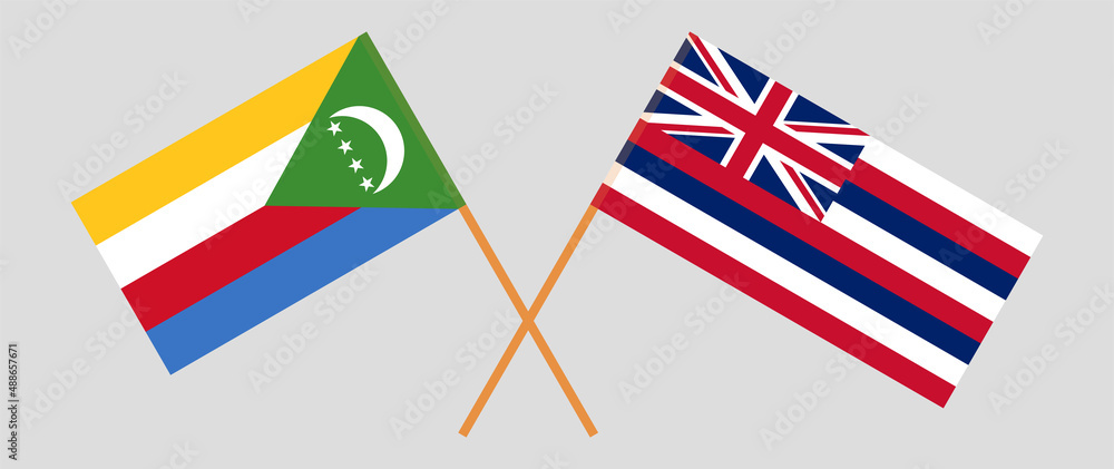 Crossed flags of the Comoros and The State Of Hawaii. Official colors. Correct proportion Crossed flags of the Comoros and The State Of Hawaii. Official colors. Correct proportion